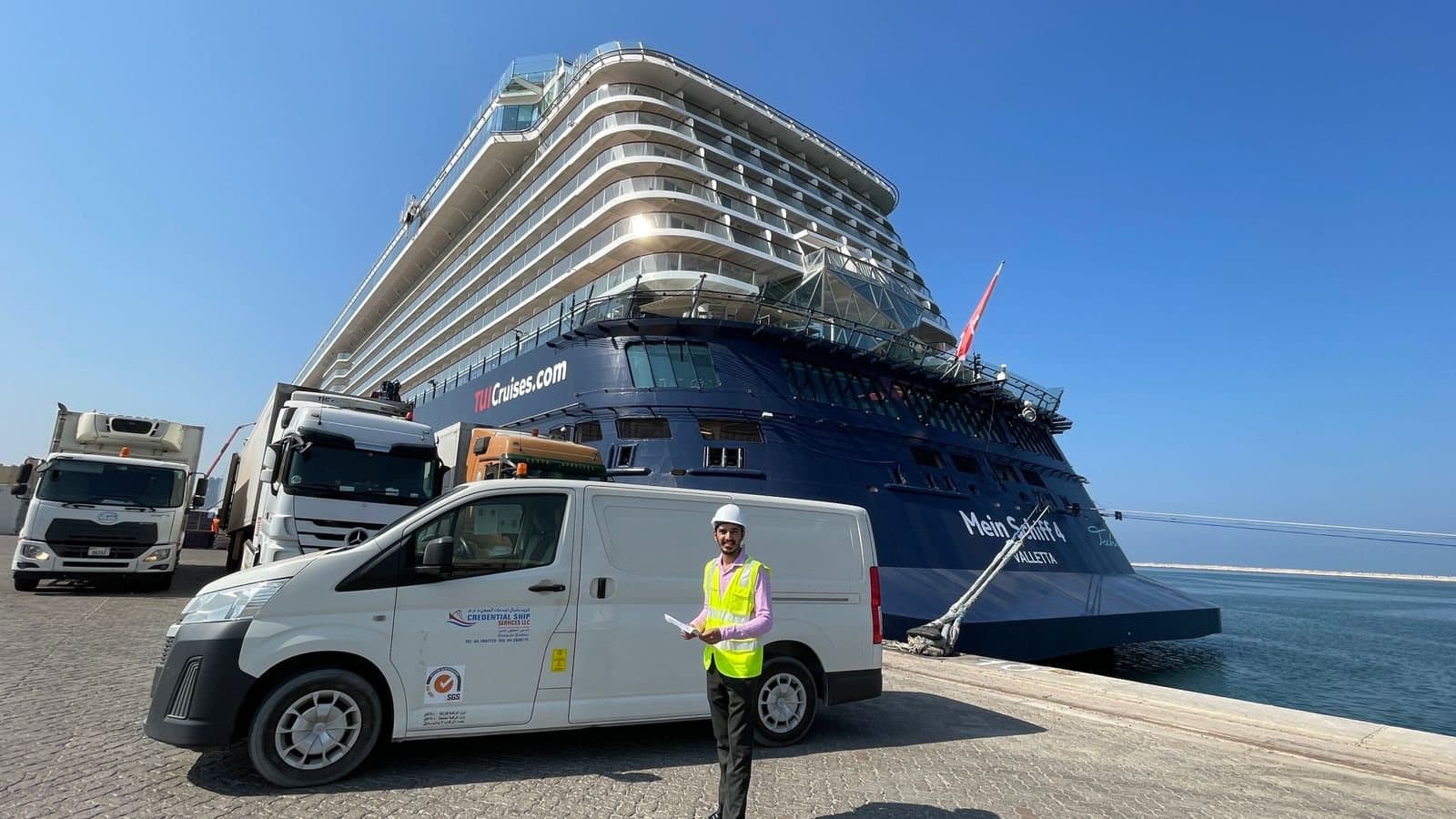 Credential Ship Services branded van alongside a cruise vessel at a UAE terminal