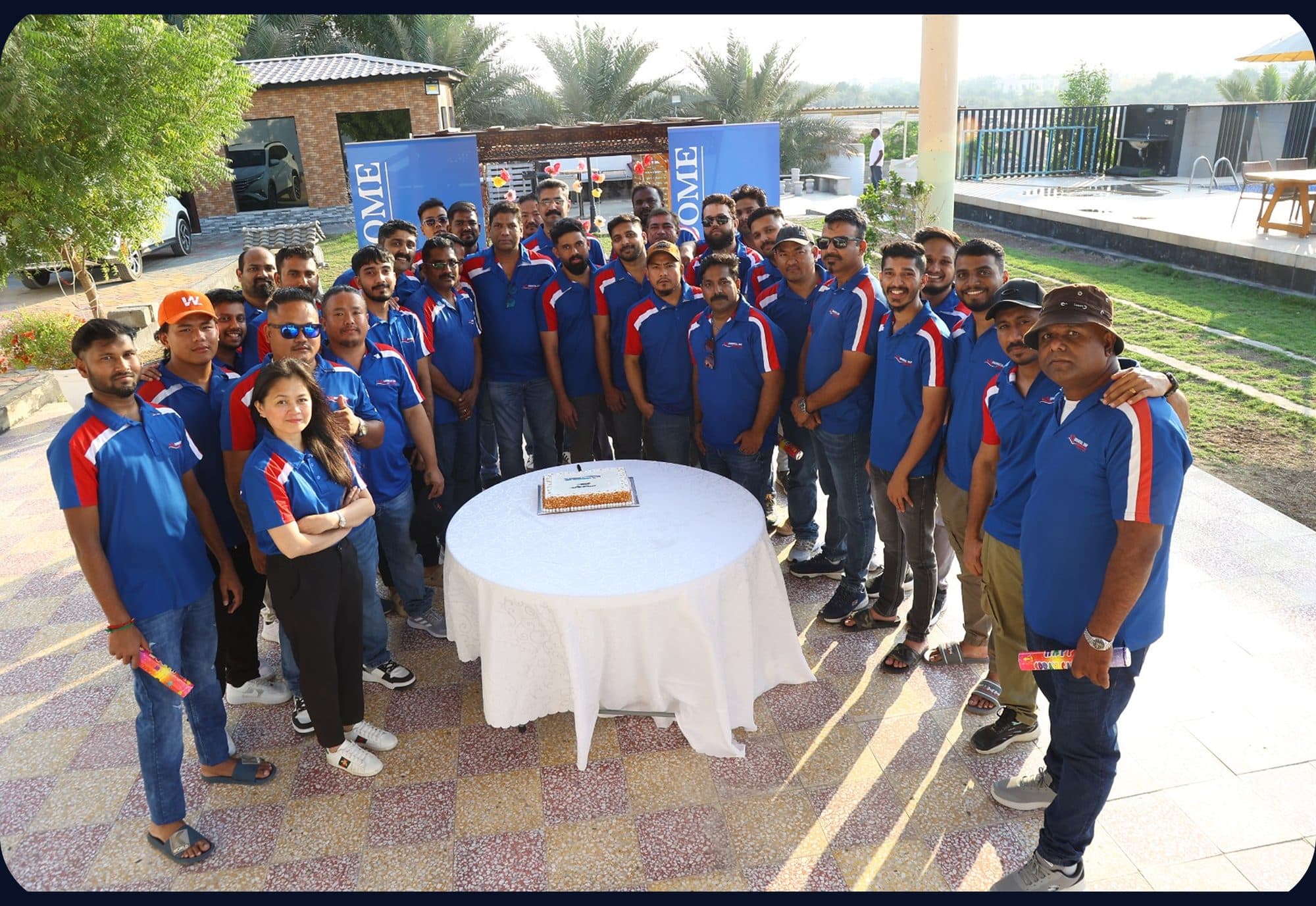 The Credential Ship Services team in branded uniform at a company gathering in the UAE